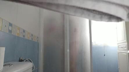 Guy showering - video 4