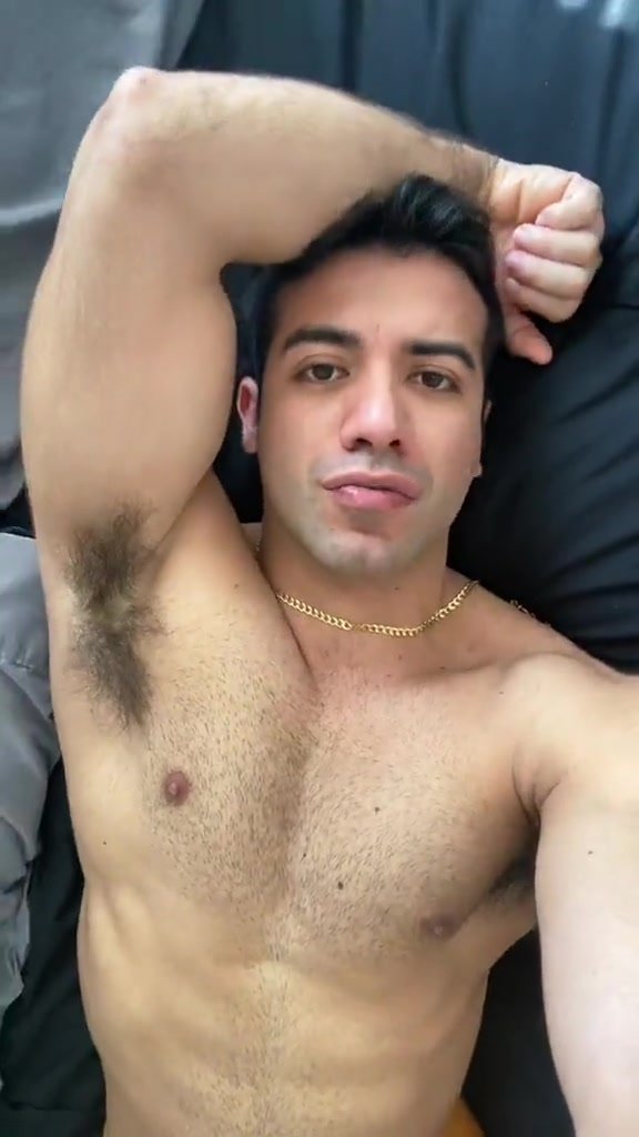 Showing off hairy armpit