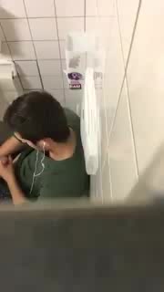 Guy wanking over cubicle