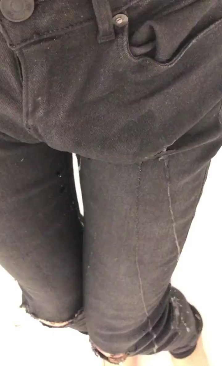 dripping pee in black jeans