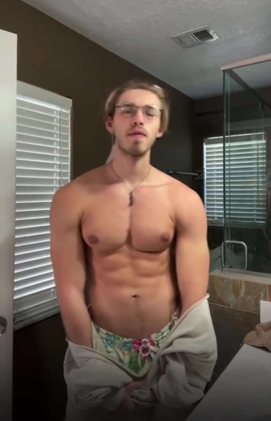 Chase cute lad shows his pecs