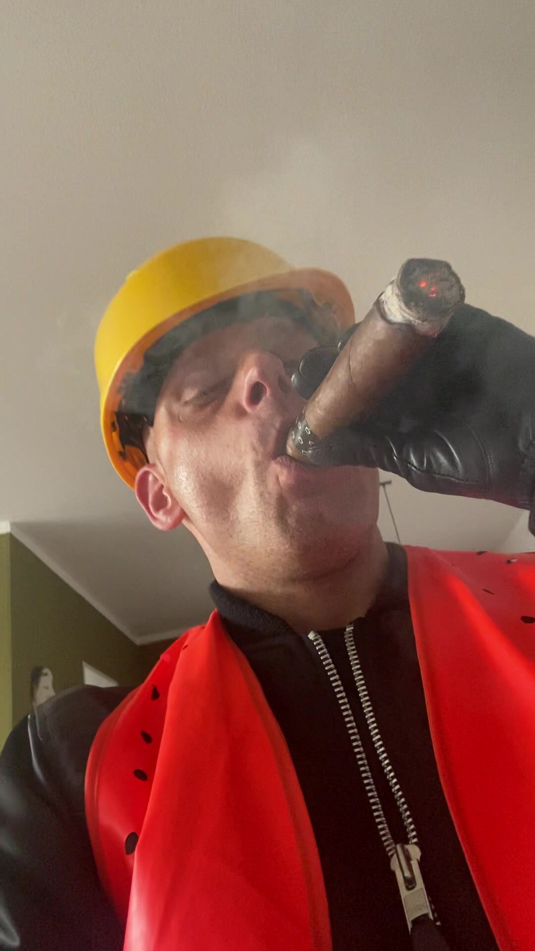 Hi Viz Worker Smoking a Cigar