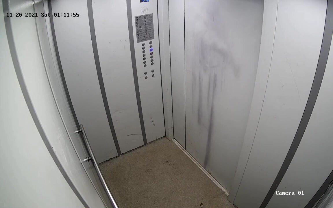 girl gets caught peeing in an elevator on cctv