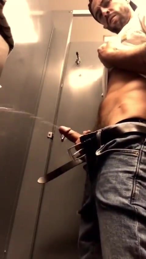 Guy cumming in the fitting room