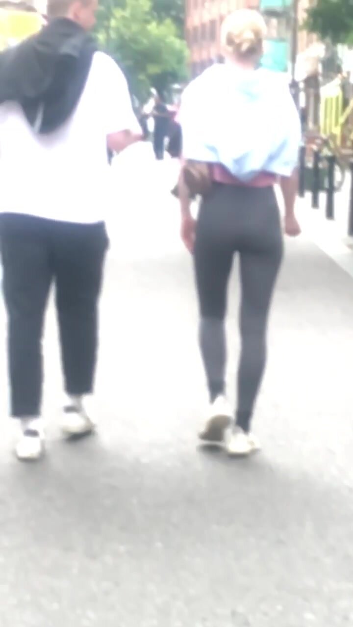 Sexy slim blonde walking in leggings