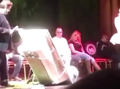 Hypnotized in a bath tub on stage