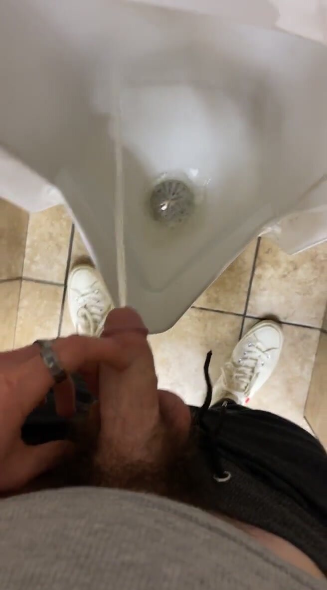 Guy takes a piss - video 2