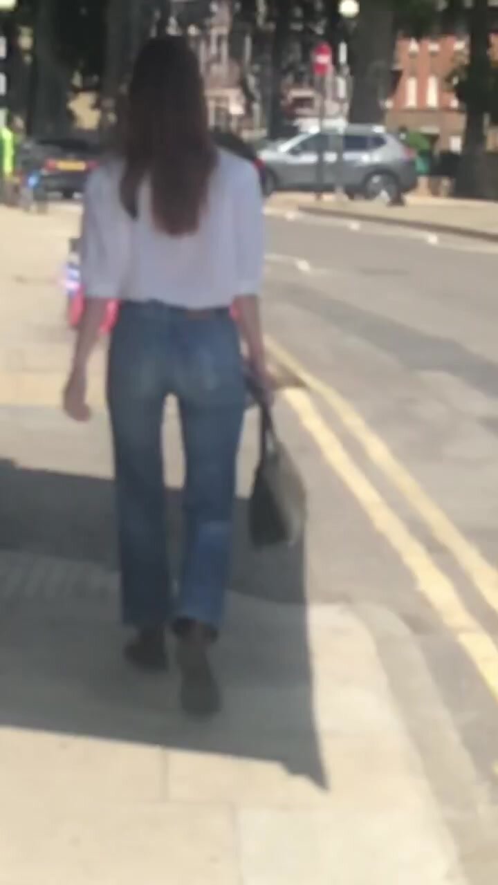 Skinny brunette in jeans