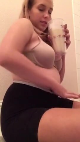chubby girl chugging heavy milk shake
