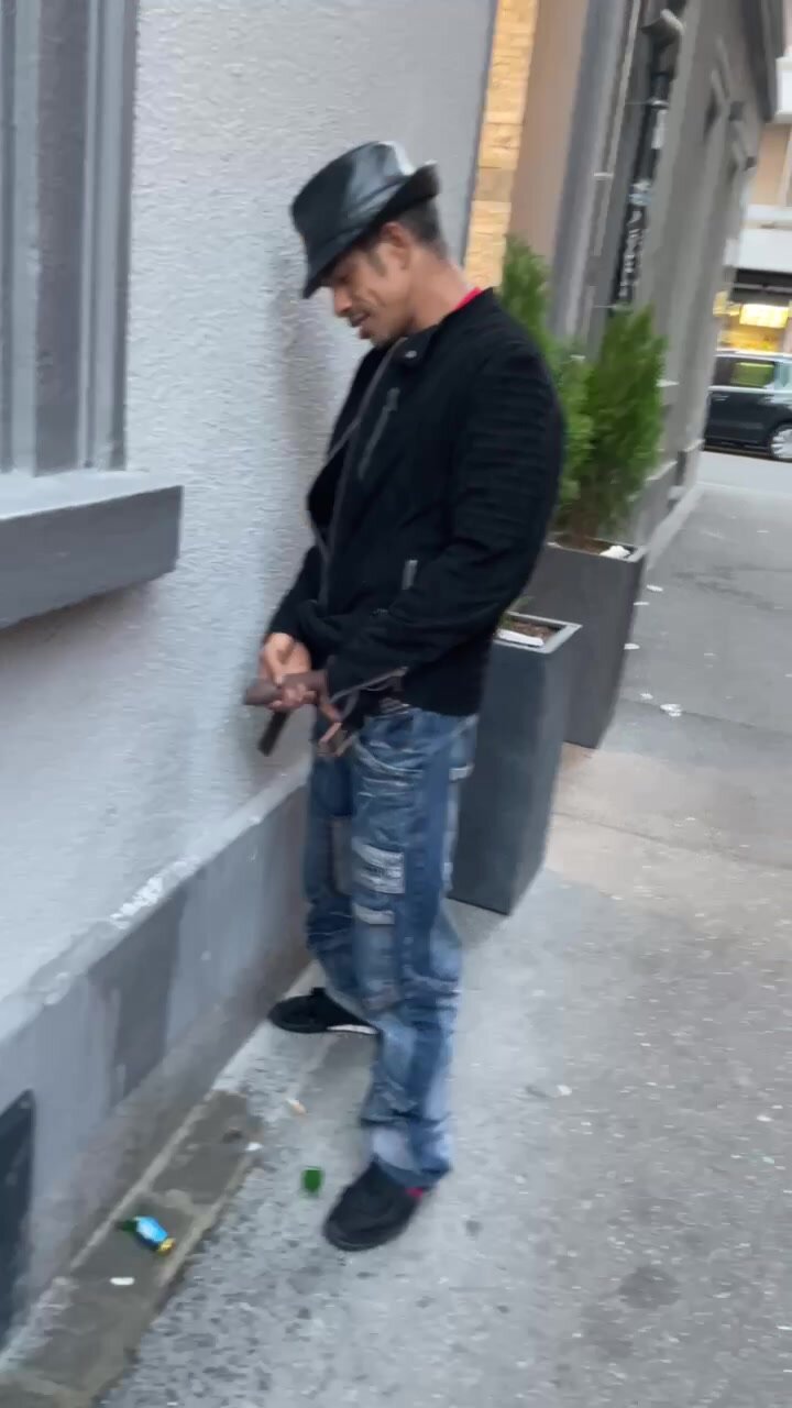 Random guy with a huge dick pissing on the street