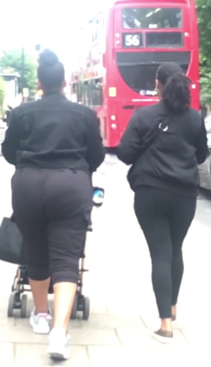 2 big ebony booties walking in public