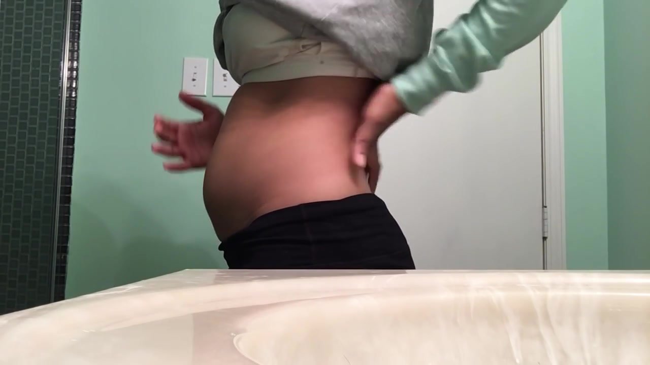 thin girl stuffing belly and after measuring