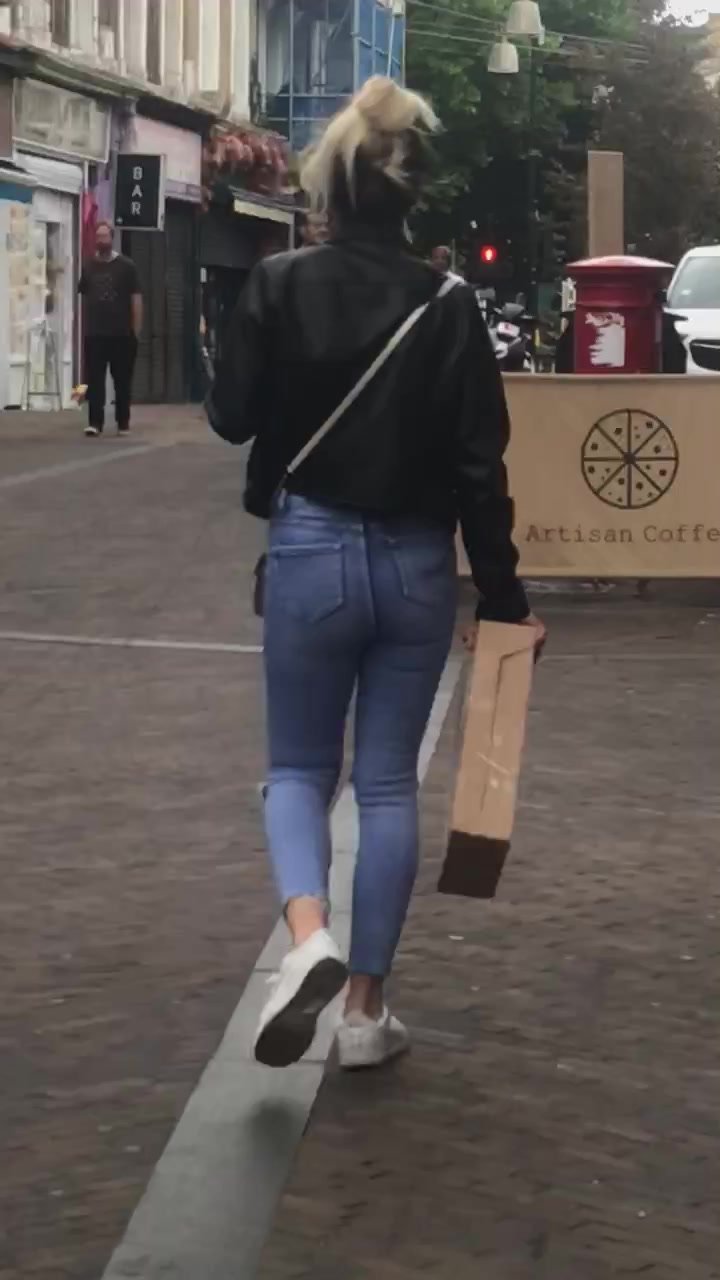 Sexy slim blonde in tight jeans