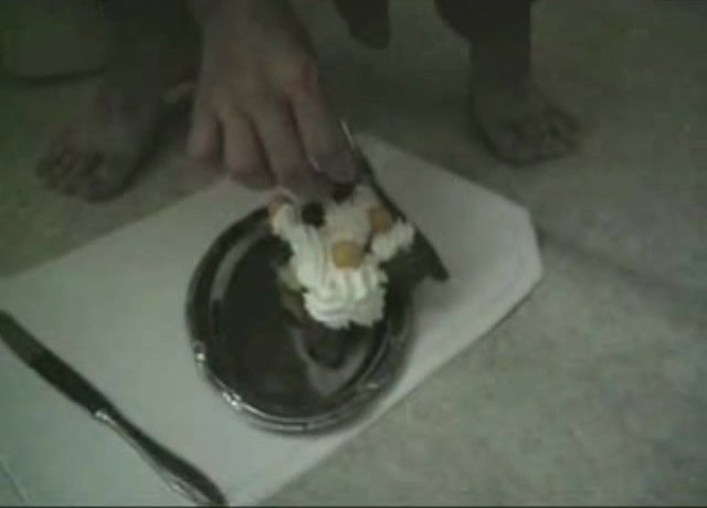 Banana Split served with shit and whipping cream