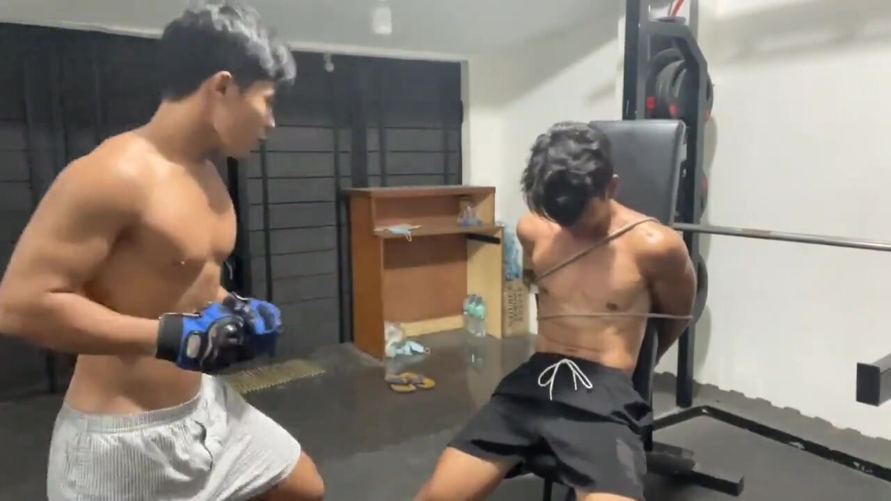 Tied up guy turned into punching bag