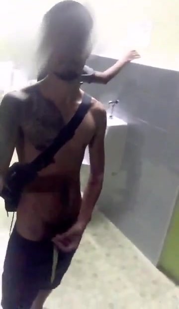 wanking public toilet near stranger