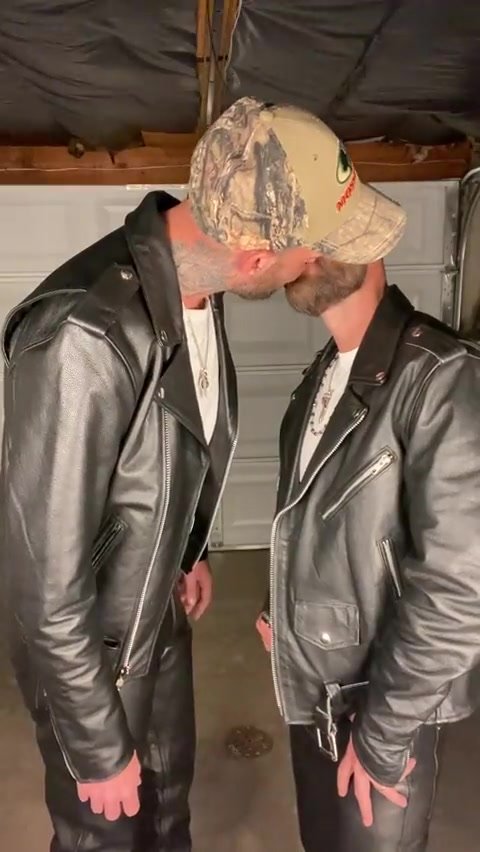 Leather thugs kissing