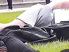 hot lad fondling his cock in public