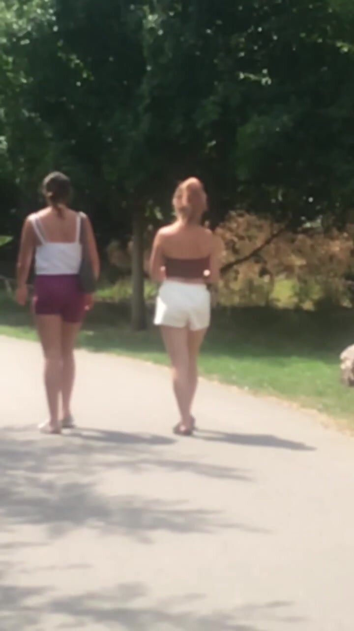 Two girls walking in shorts