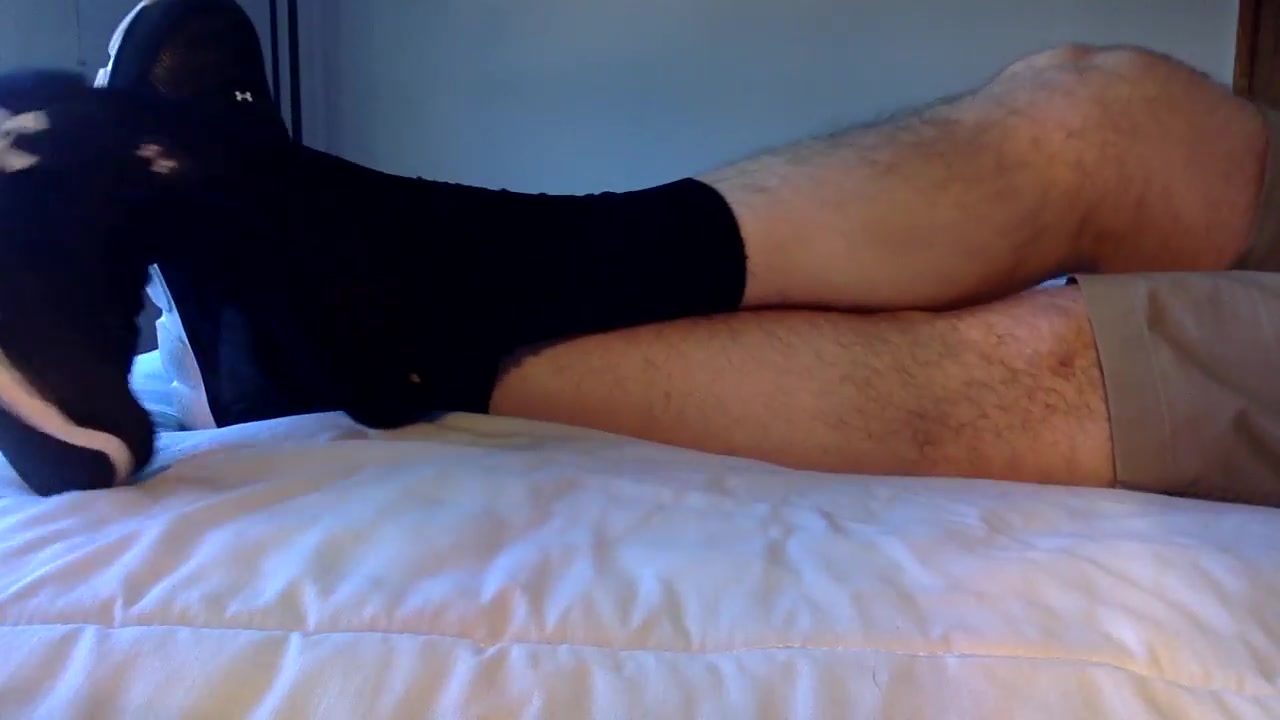 black nylon socks and bare feet