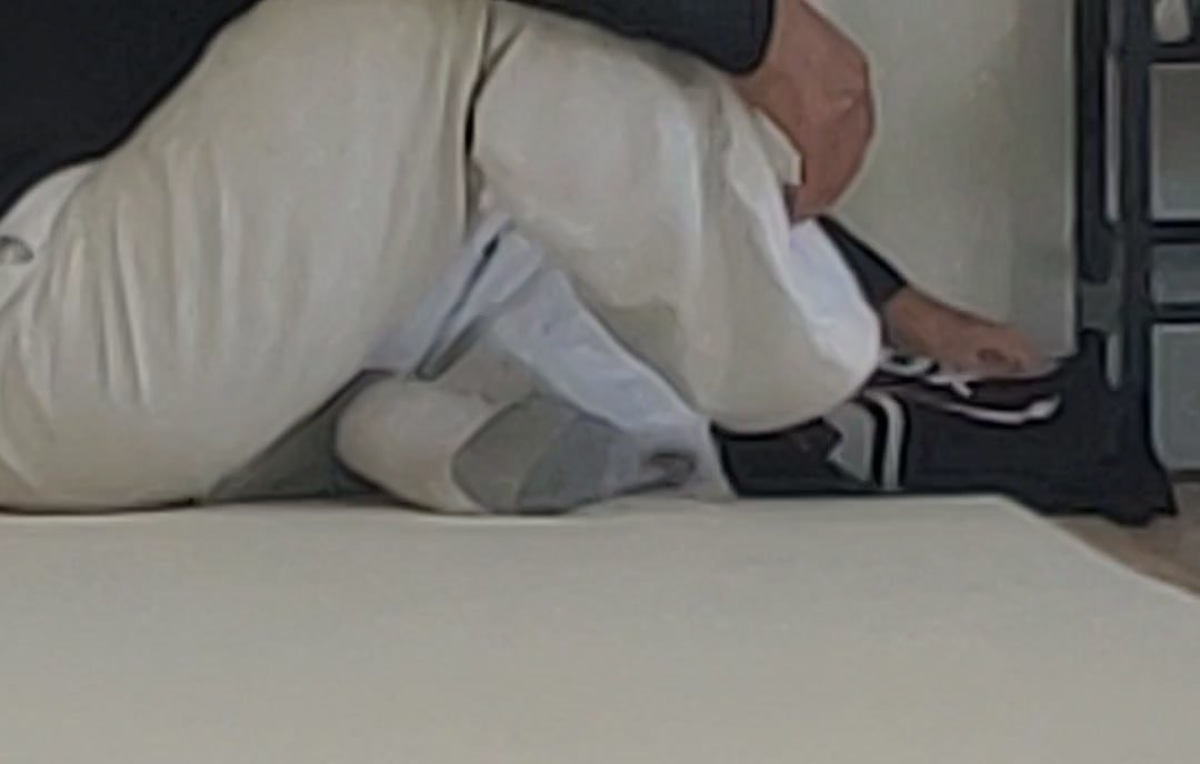 Syrian Grandpa putting socks on 4