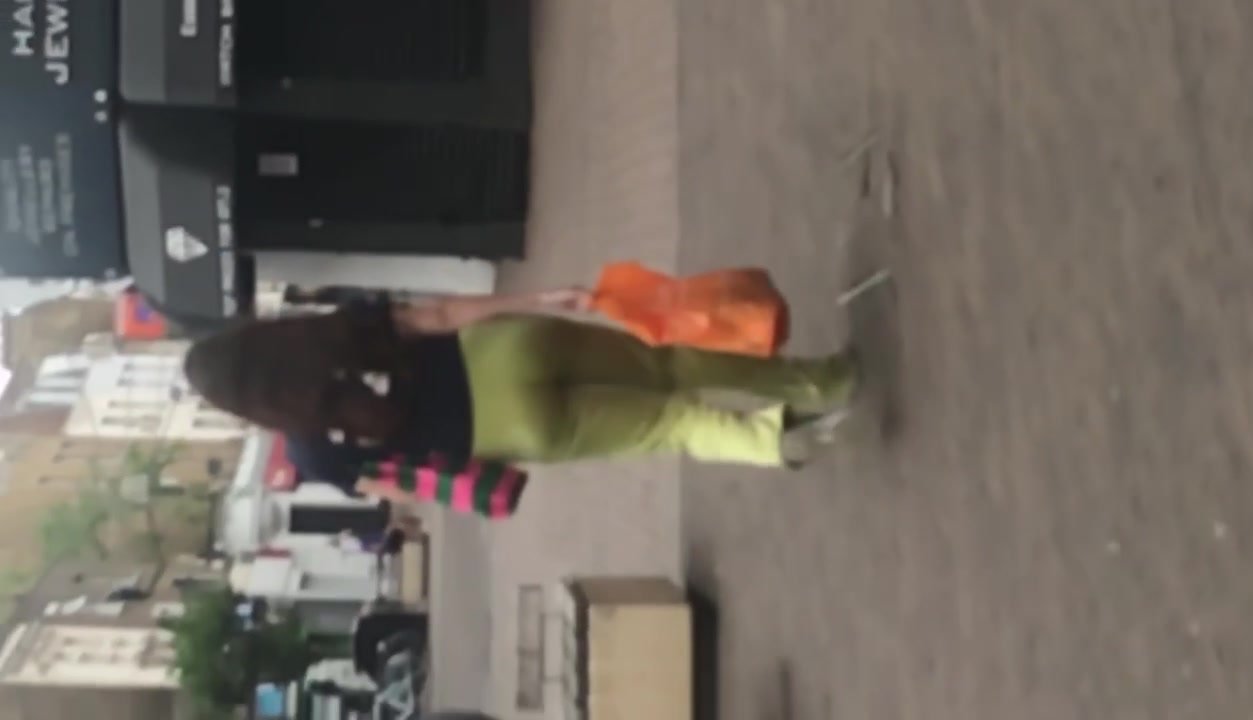 Fit brunette in lime green pants