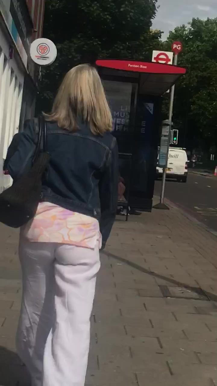 Mature milf in white pants