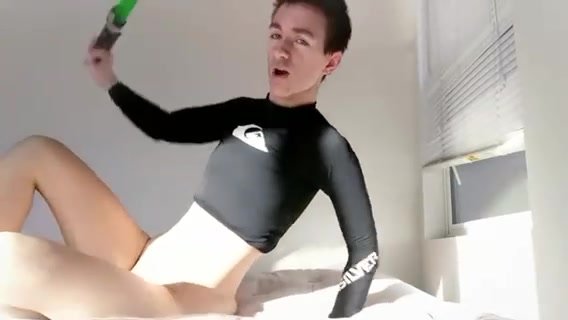 Man using lightsabers as dildo
