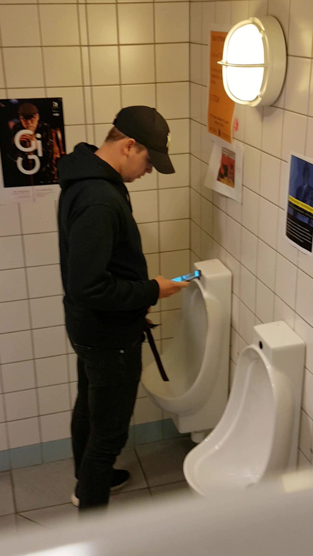 Spy at urinal