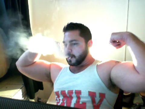 muscle guy smoking - video 3