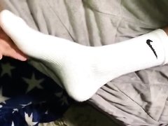 Sleeping boyfriend in Nike socks