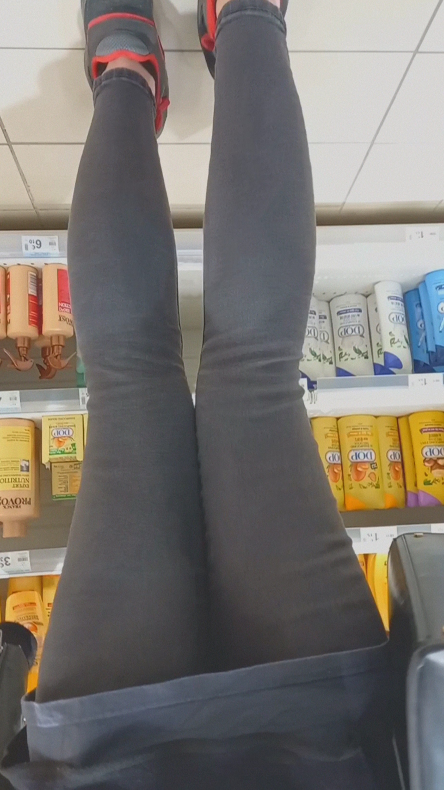 Girl with a tight jeans in store