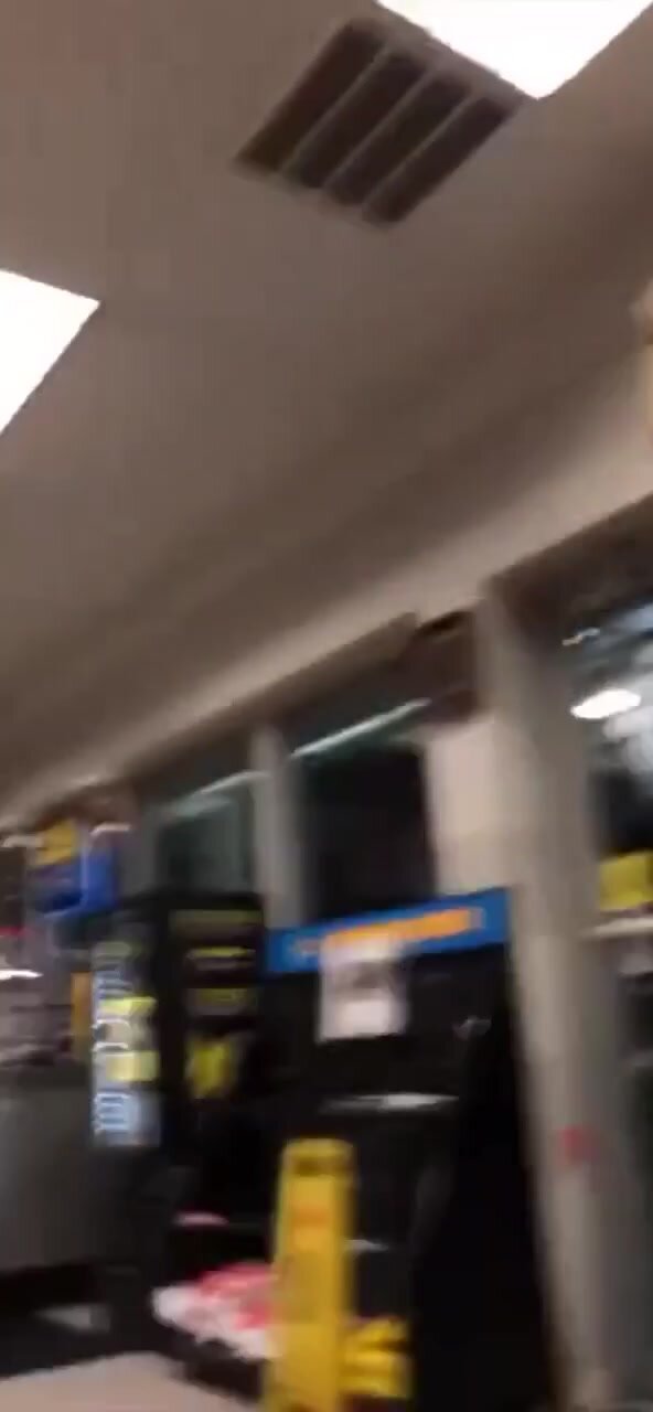 Pissing herself in gas station public