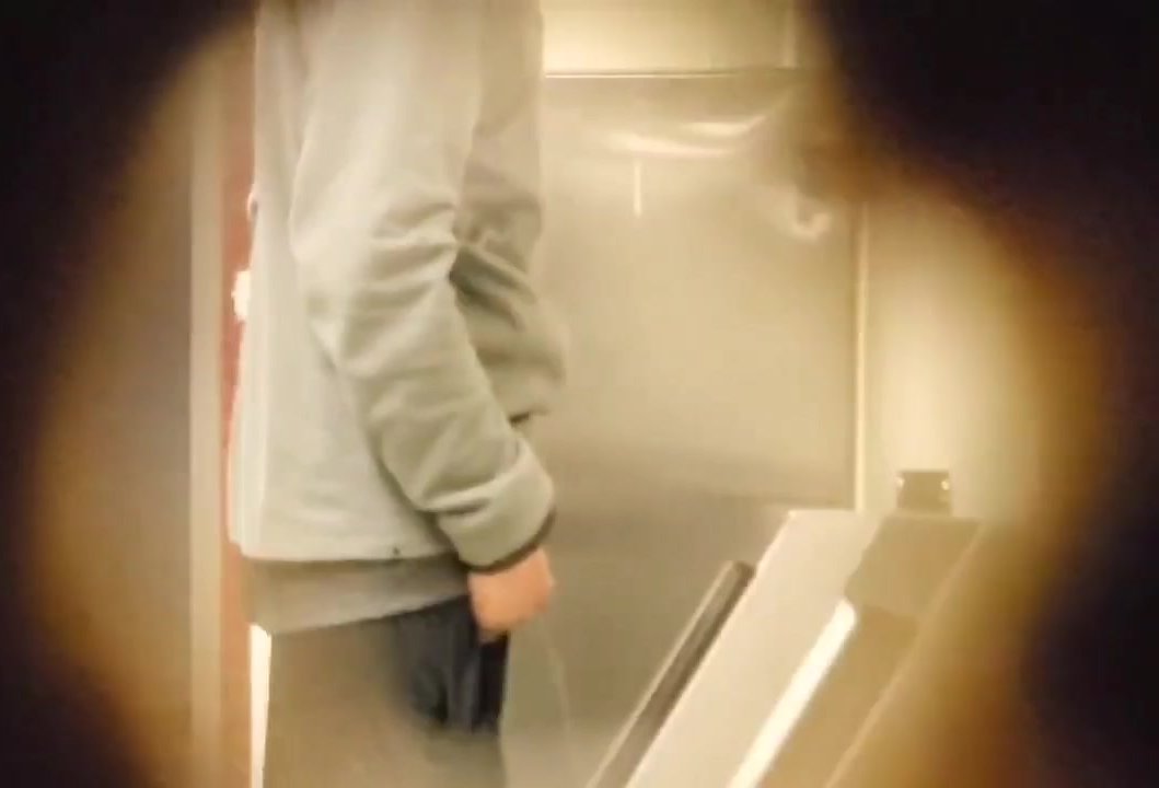 Hot British chav pissing and spitting in urinal