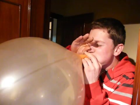 Man blow balloon