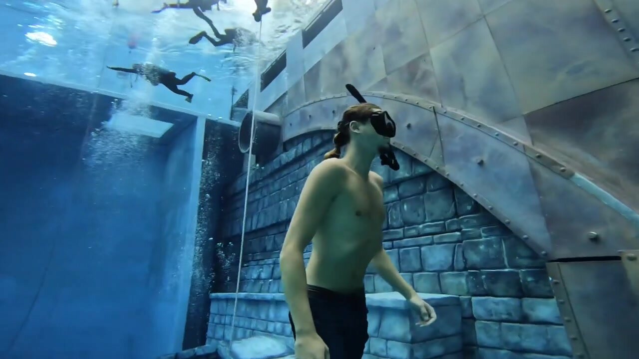 French fit freediver breatholding underwater