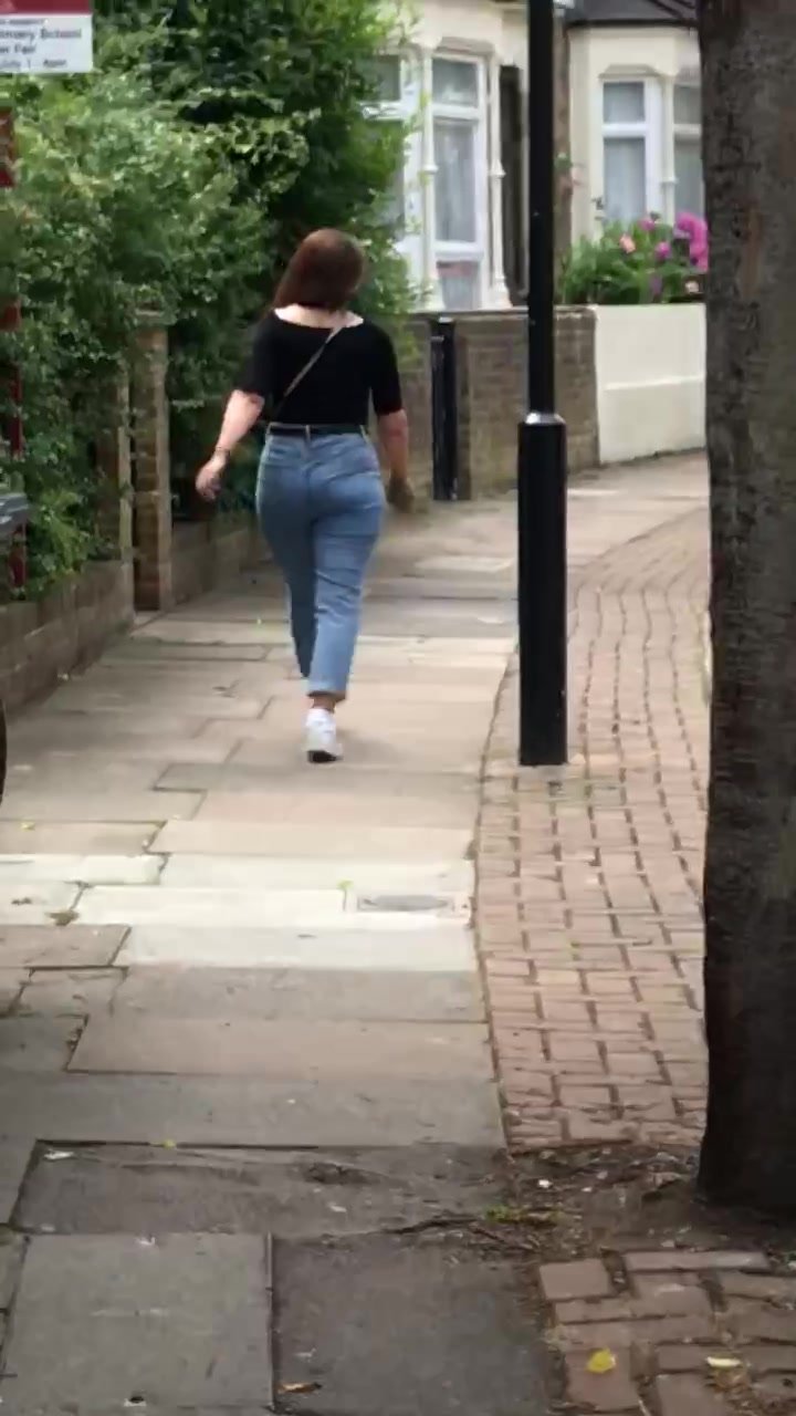 Sexy brunette milf in jeans