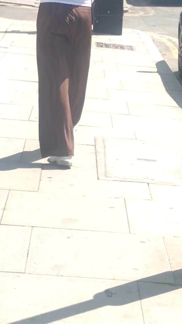 Brunette walking with a jiggly ass