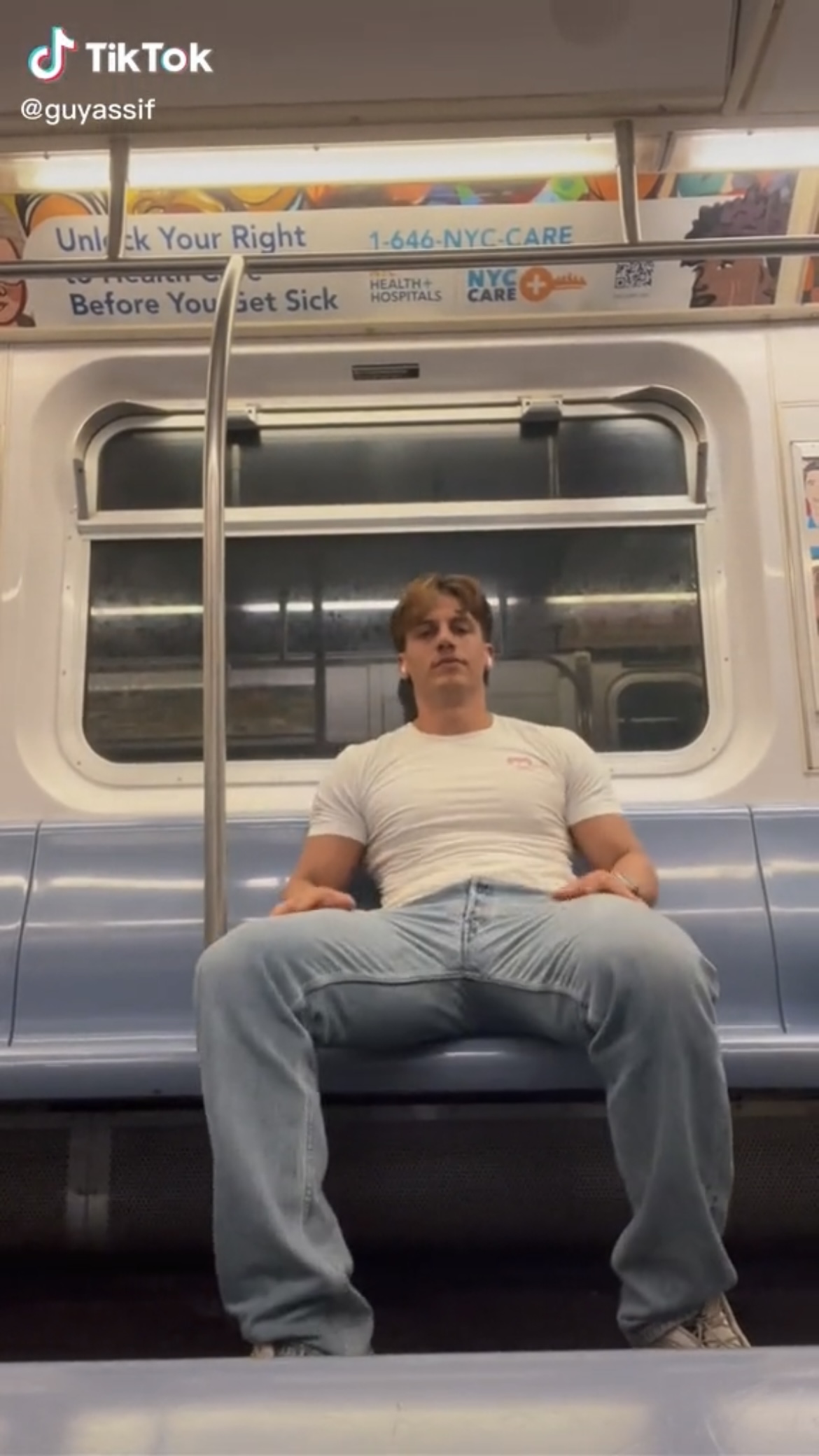 Hot dude manspreading on the subway