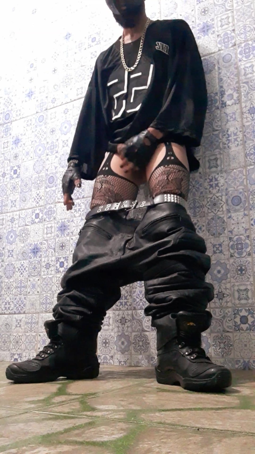 Scally boy with stockings  baggy leather smoking.