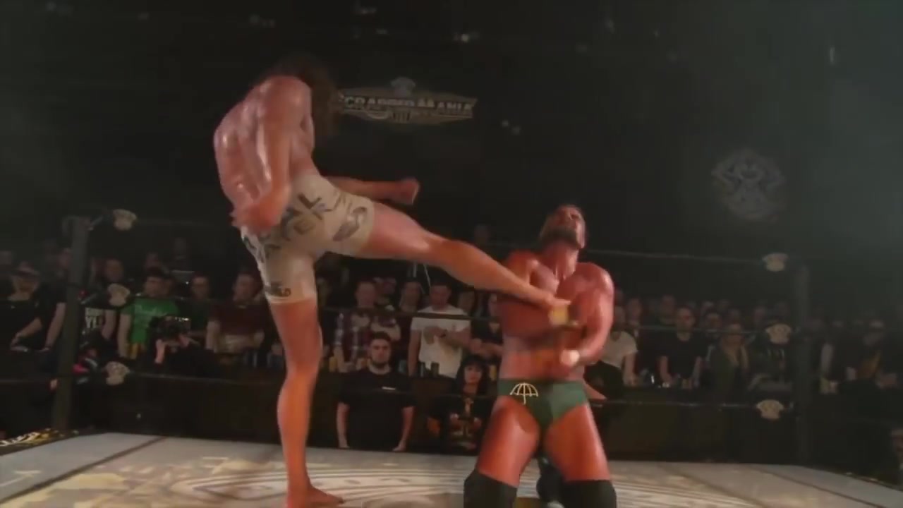 Wrestler Stomps Opponent's Head and Kicks His Chest