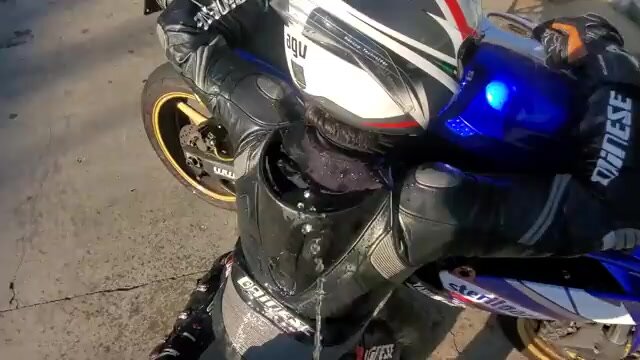 Dainese suit getting showverd wiht his piss
