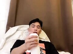 Asian man try out tenga and cum