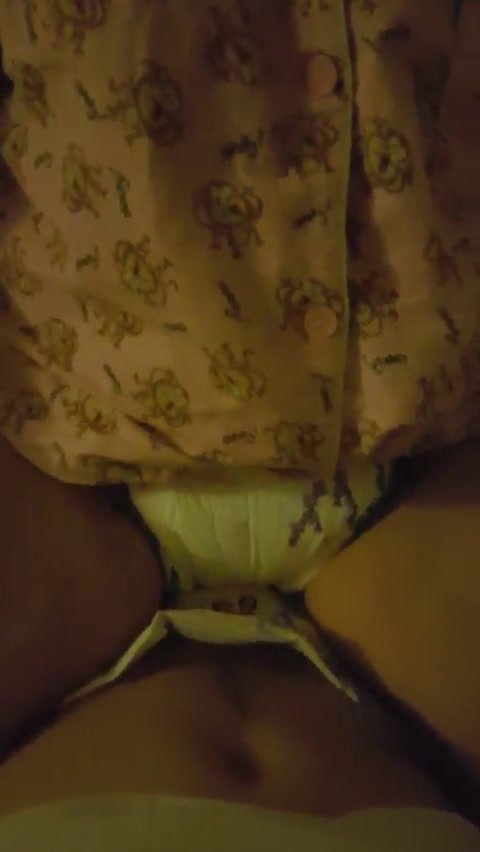 Diaper girl sits on daddy