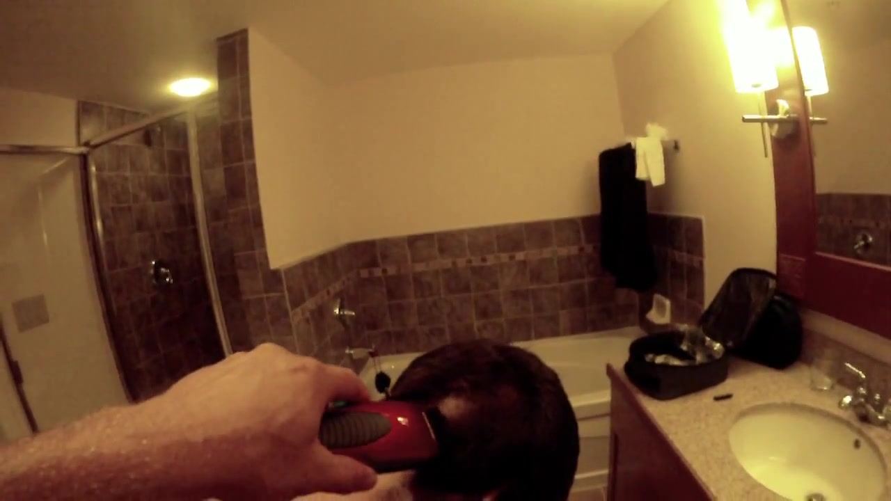 Man secretly shaves his friend