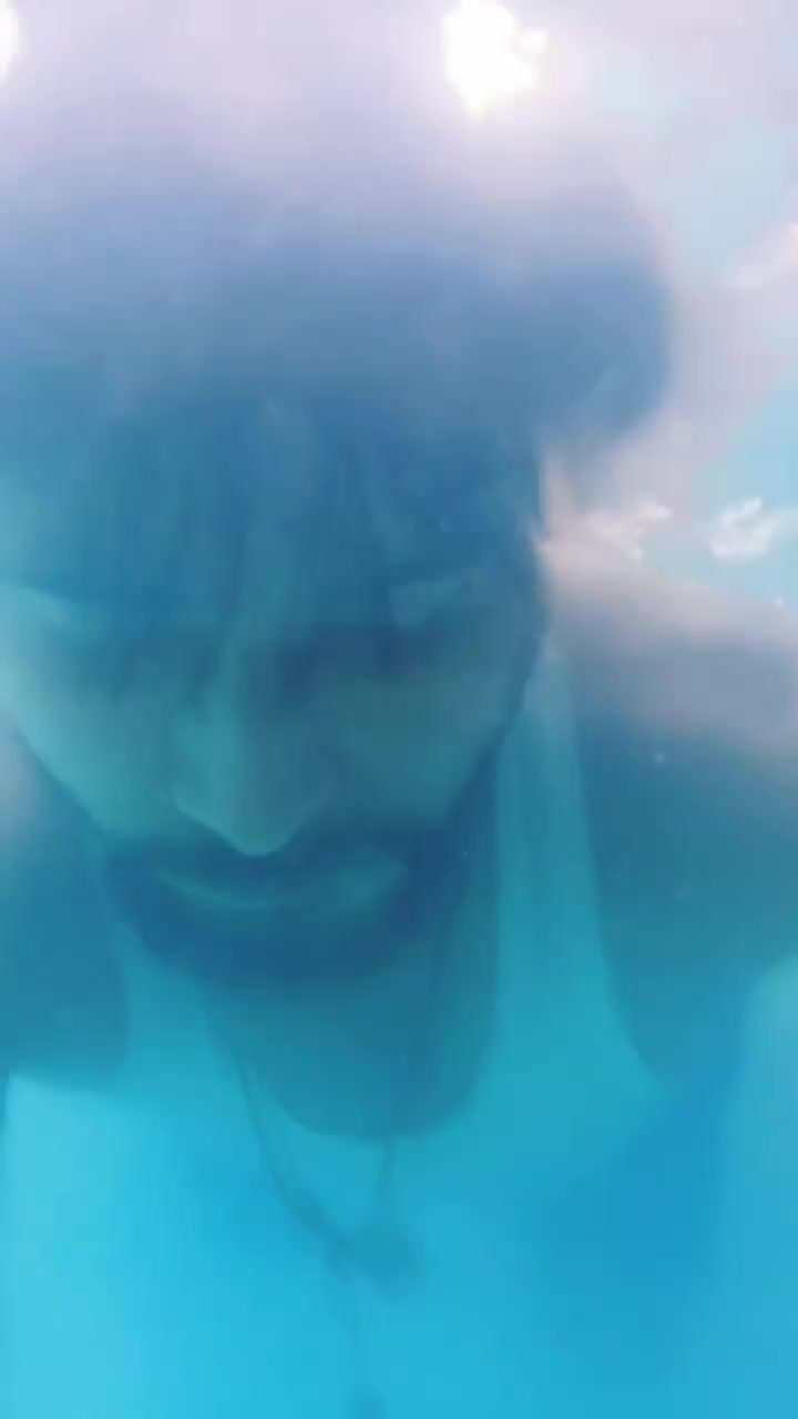 Underwater barefaced indian in tank-top