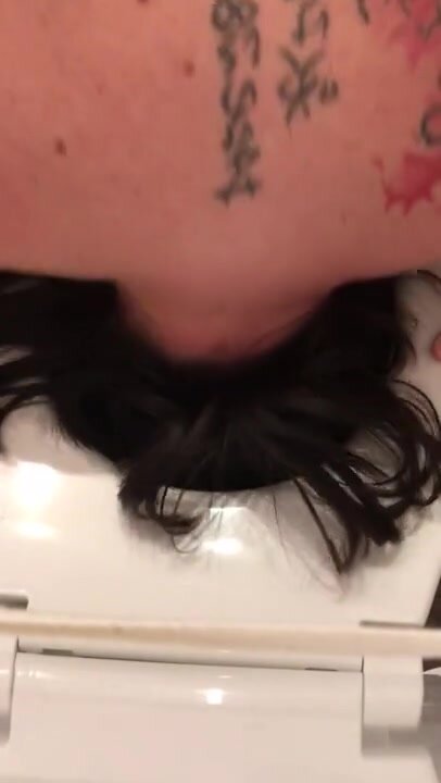 Toilet slave instructed to flush her head