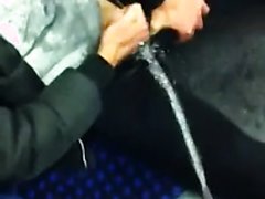 Guys playing with piss in the underground