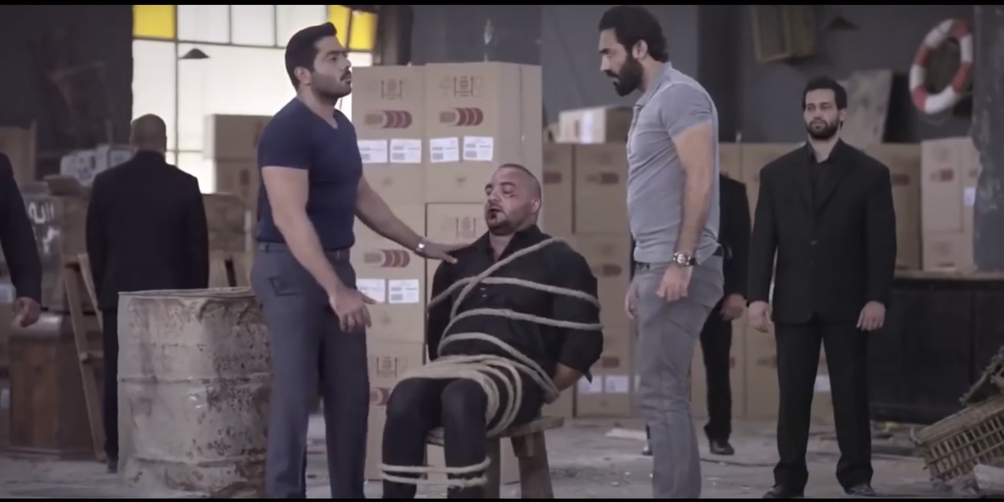 Egyptian man chairtied and punched