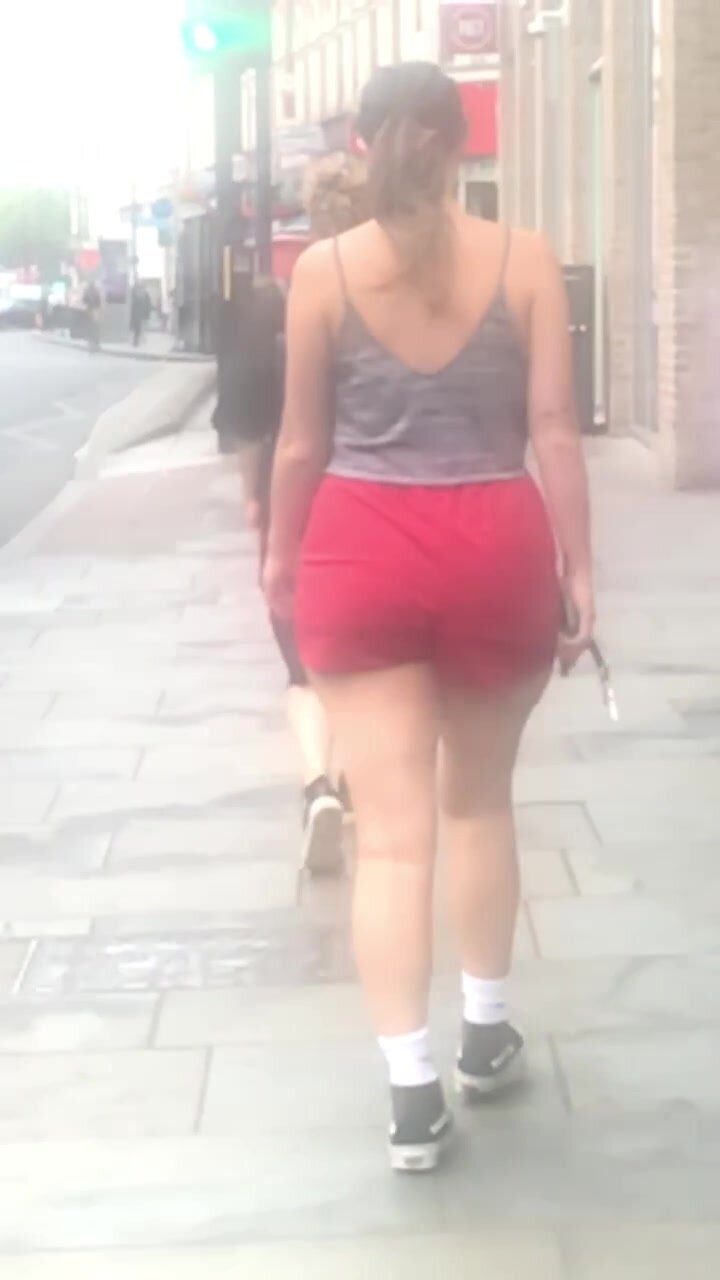 Thick brunette in red shorts